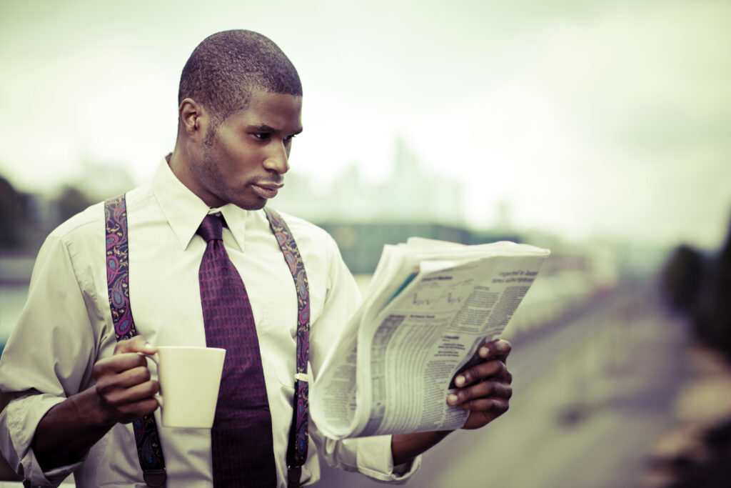 Man reading newspaper